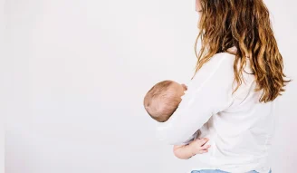 An image of a mother breastfeeding her child