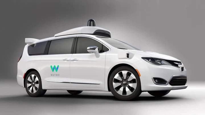 Image of Waymo self driving cars white