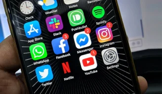 A pic of iPhone with social media apps in the view