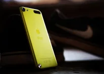 A photo from back of yellow iPod touch