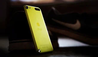 A photo from back of yellow iPod touch