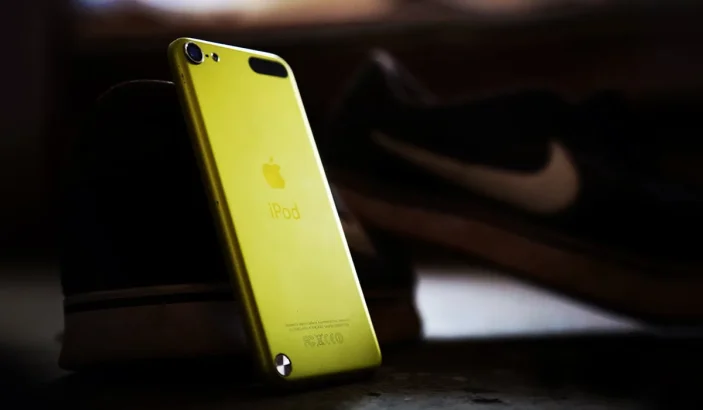 A photo from back of yellow iPod touch