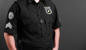 A photo of Police uniform with body camera