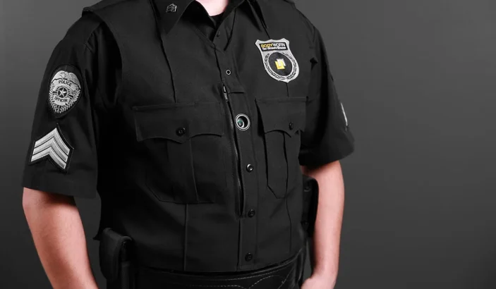 A photo of Police uniform with body camera
