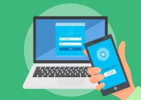 A laptop and a phone with two factor authentication enabled