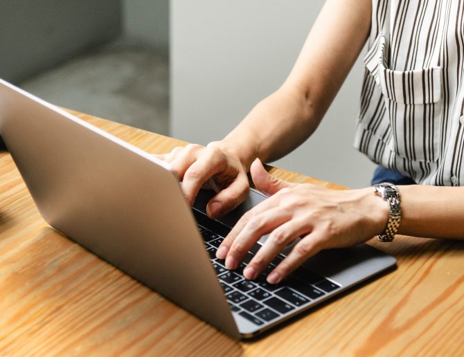 A Woman Working On Her Laptop