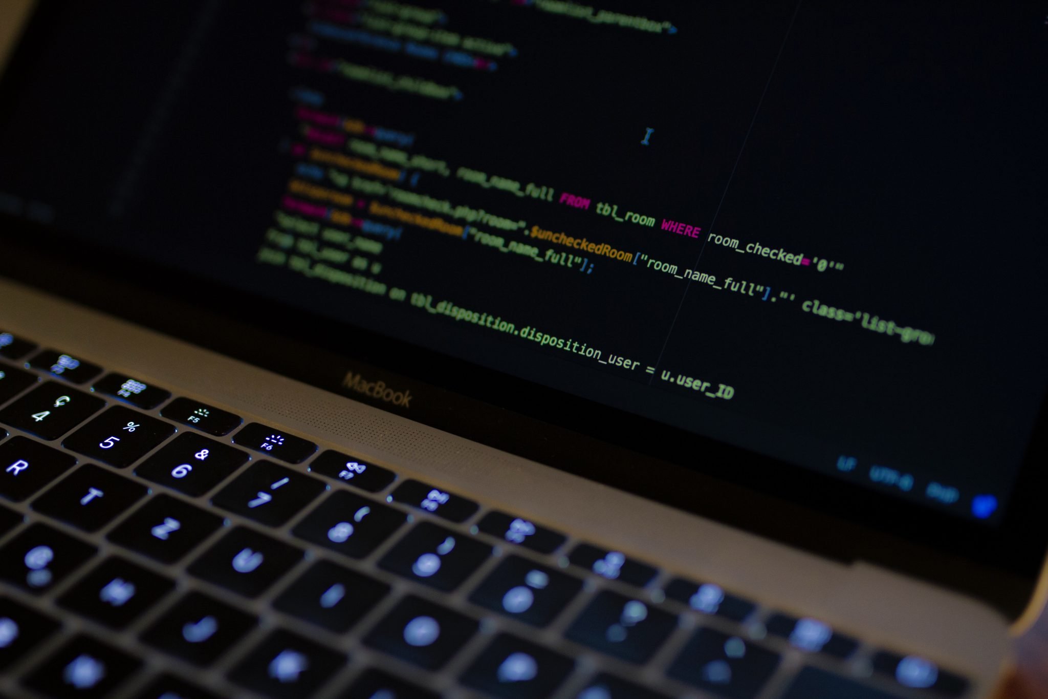 Code displayed on a MacBook