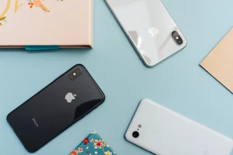 A photo of iPhone X, iPhone XS, and Pixel 3 XL cameras