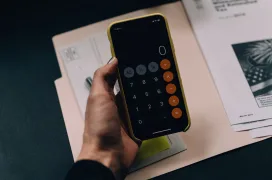 A person using calculator