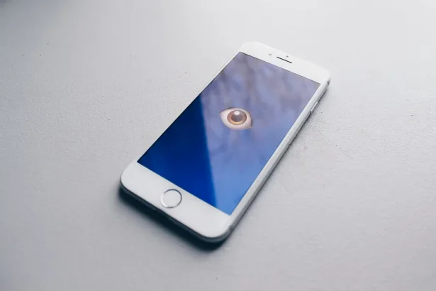 A phone with eye emoji showing privacy breach