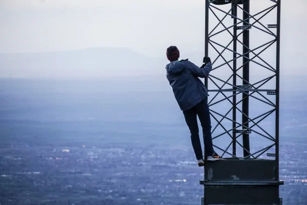A person on a network tower