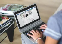 A person using a computer Description automatically generated
