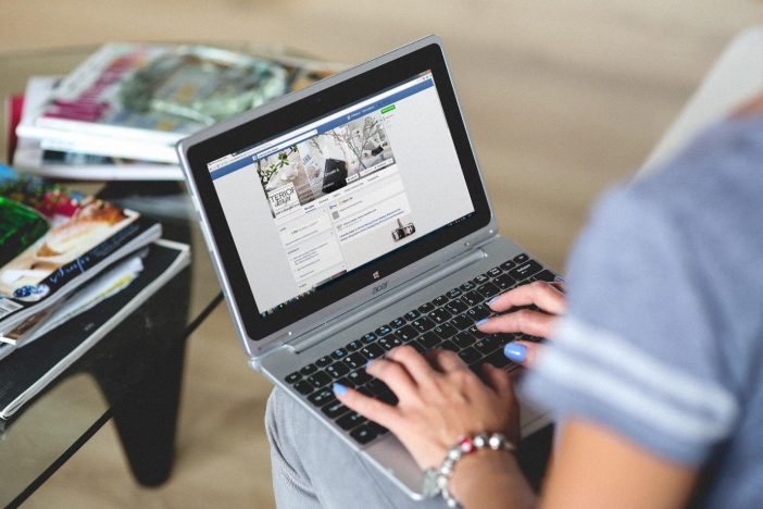 A person using a computer Description automatically generated
