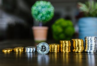 close up shot of stock of coins