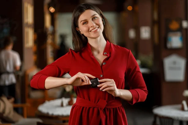 A girl holding earphones