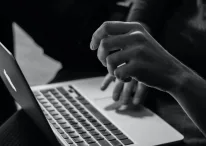 A person working on a notebook