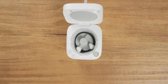 An aerial view of earbuds washer