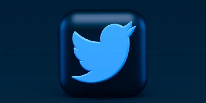 An icon of Twitter with dark blue squared background