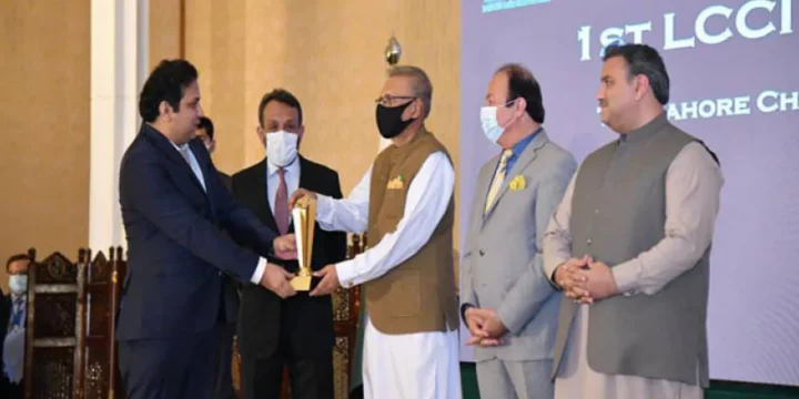 Jazib Zaman receiving best software company award for TechAbout