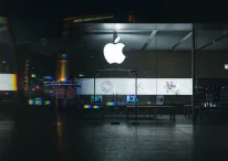 Apple logo bright hanging on an Apple store