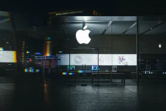 Apple logo bright hanging on an Apple store