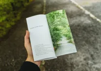 A picture of flyer in the hands of a person